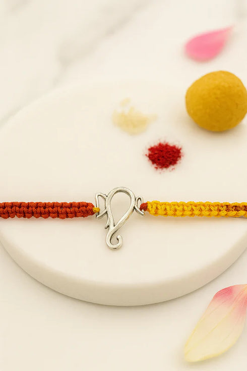 ganesha symbol silver rakhi