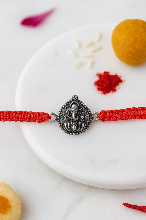 Ganesha on Lotus Pure Silver Rakhi