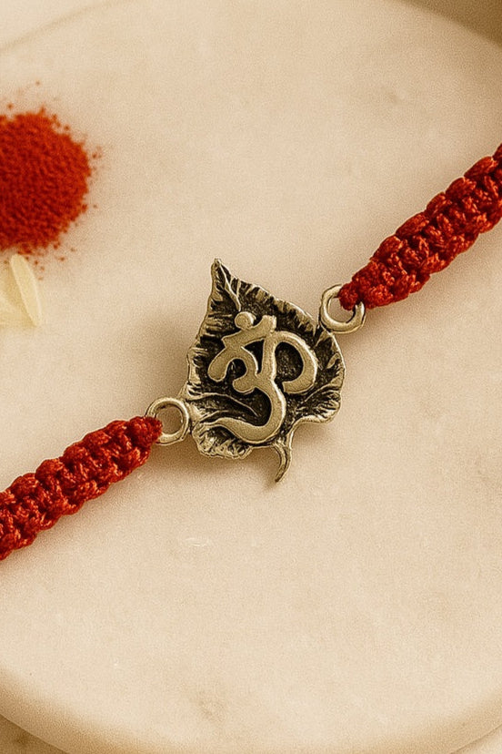Om on Leaf Pure Silver Rakhi