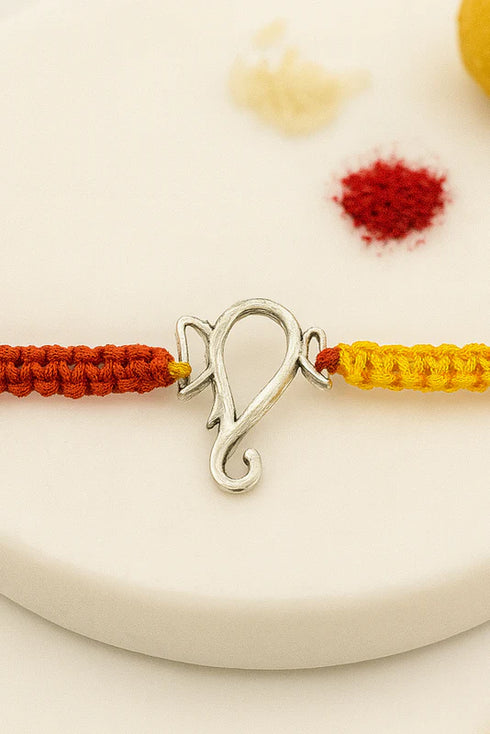 ganesha symbol pure silver rakhi